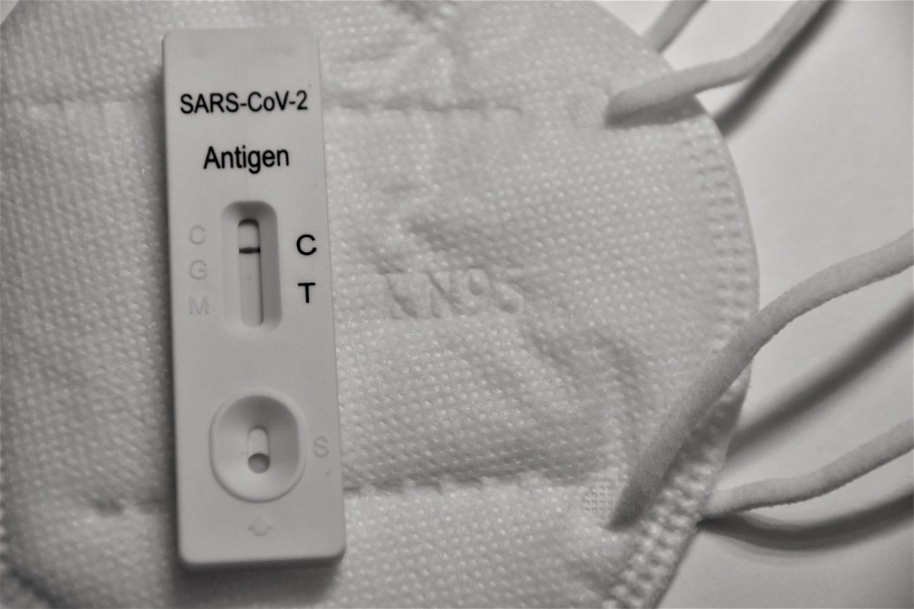 SARS-Cov2 Antigen (Covid-19) test, with an N95 mask.